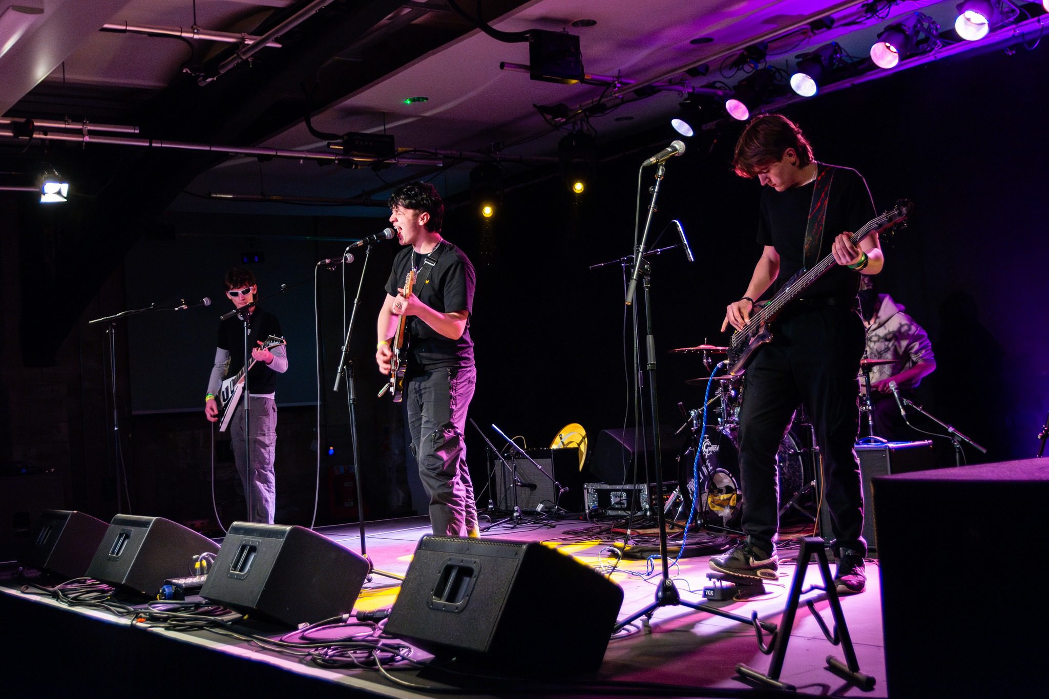 A band playing live on stage