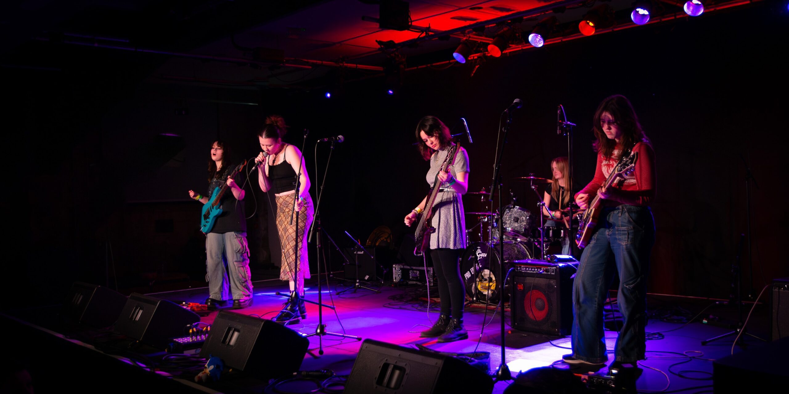 A band playing live on stage