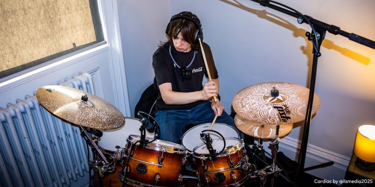 Recording and Rehearsal Space Image credit – @ilsmedia2025 A young musician playing the drums during a recording session