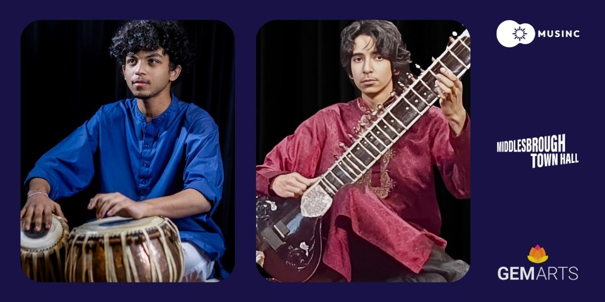 Two young musicians playing a tabla and a sitar.